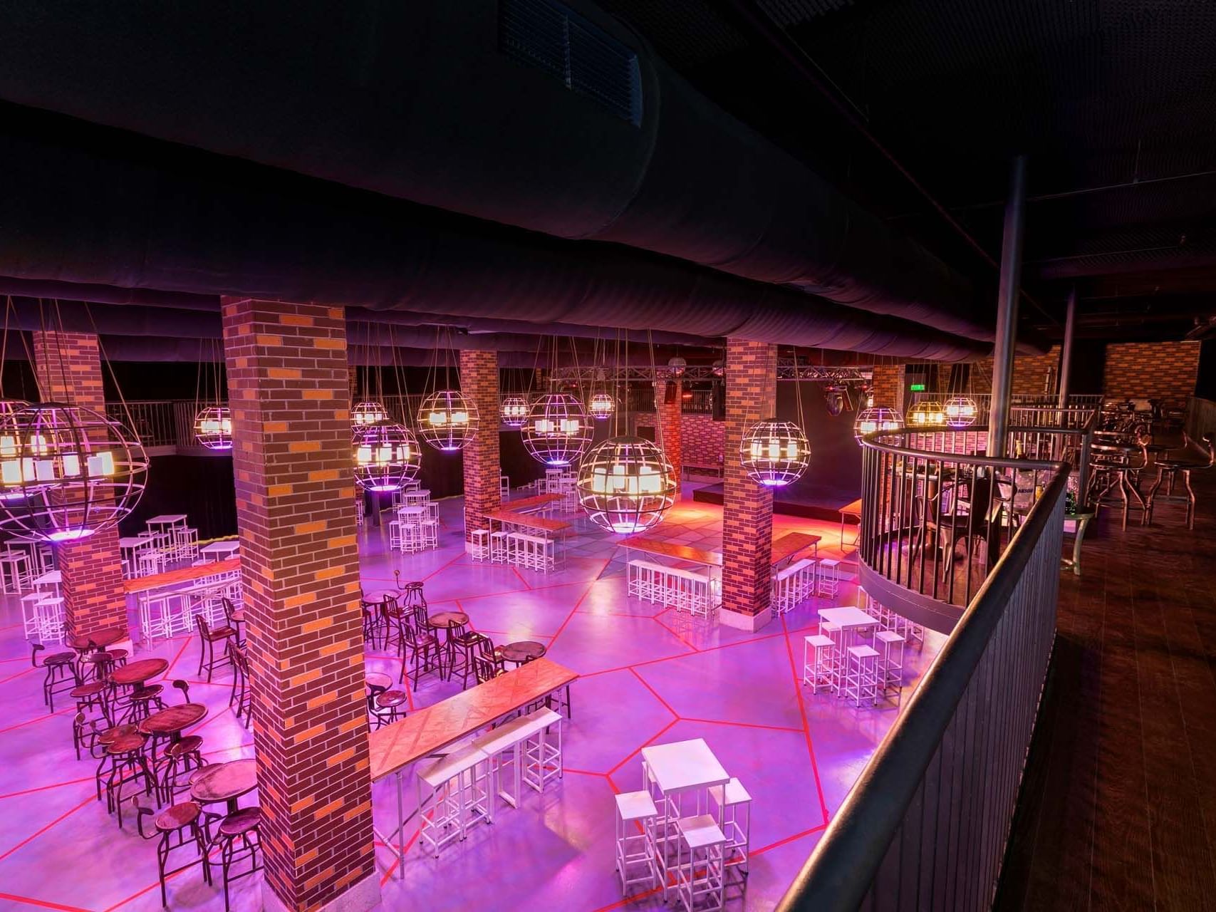 Modern bar interior with purple lighting near Titanic Deluxe Golf Belek