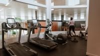girl working out in fitness centre