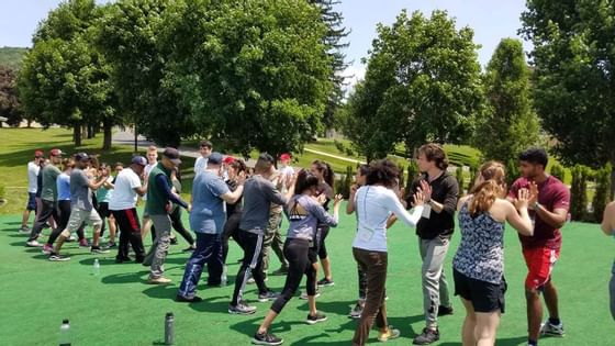 People doing teambuilding activities near Honor’s Haven Retreat