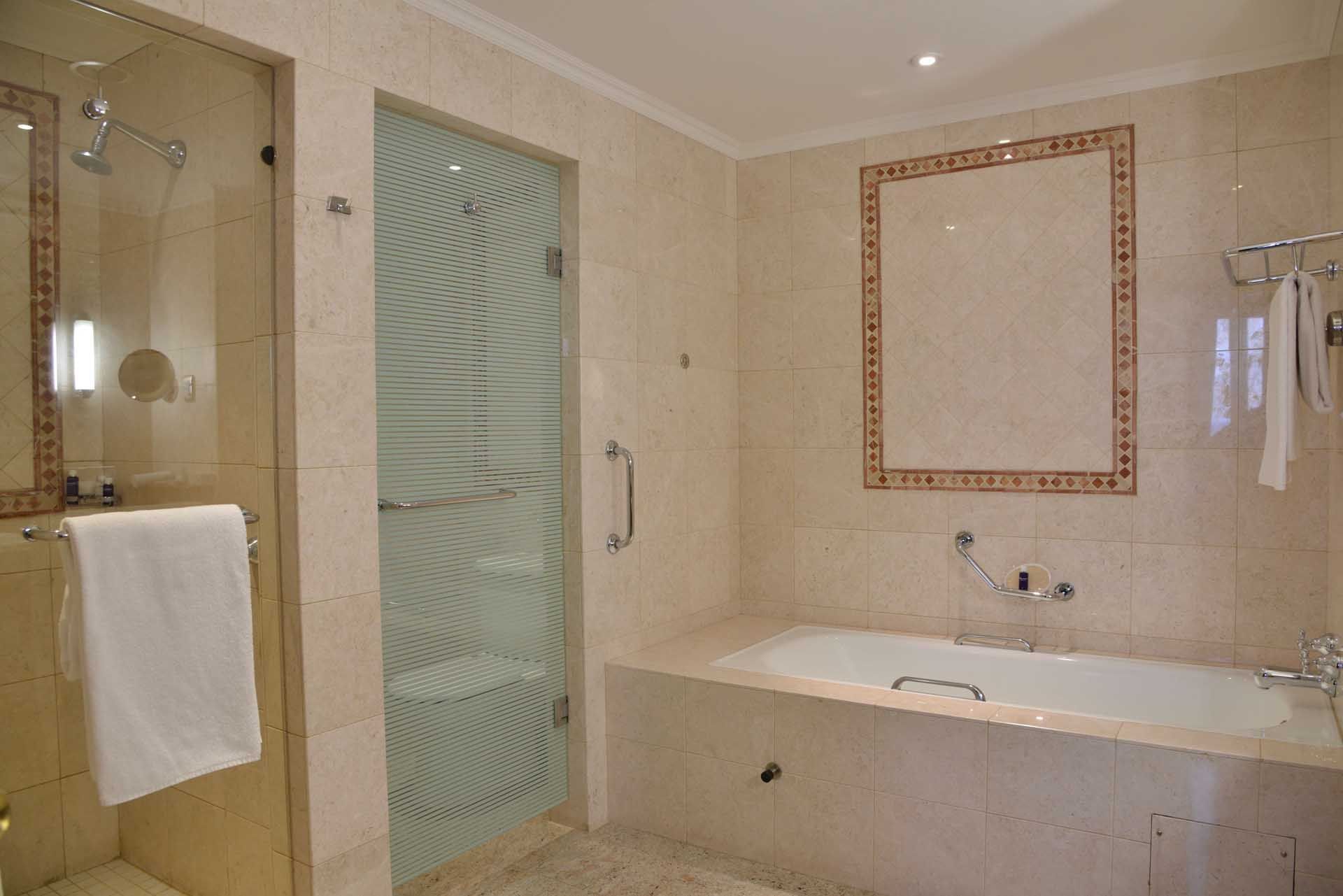 The Bathroom tub in the Deluxe Room at Polana Serena Hotel