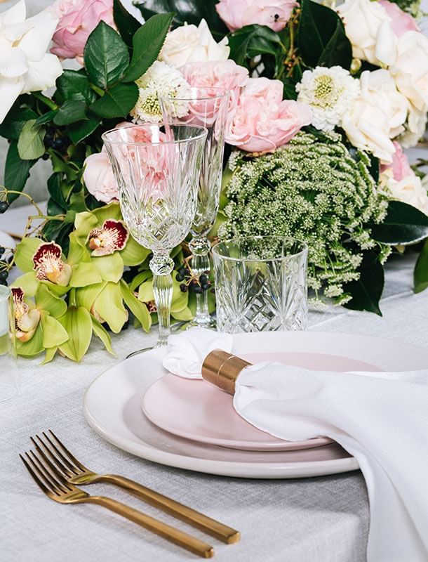 Close-up of glassware & décor on a table at Crown Towers Sydney