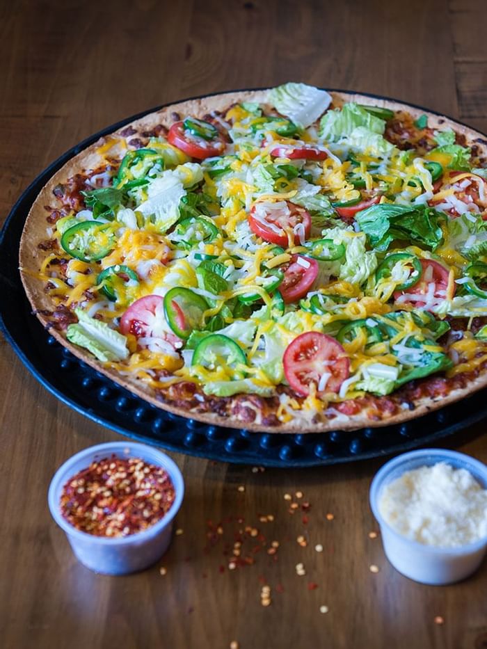 Close up of Pizza served in Bruno’s Pizza at Watersound Inn