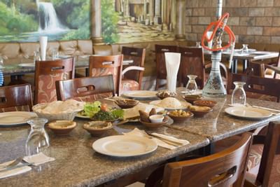 A dining table arranged with food at Playa Blanca Beach Resort