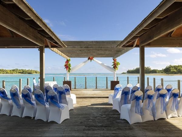 Chairs for wedding ceremony near the sea at Warwick Le Lagon 