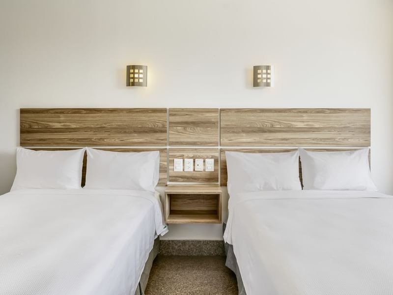 Interior view of Superior Room with two twin beds at One Hotels