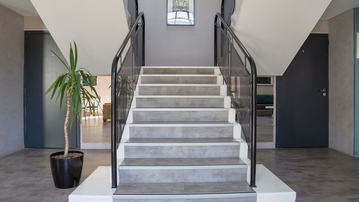 Stairs with handrails at Hotel Novella Confort Nantes East