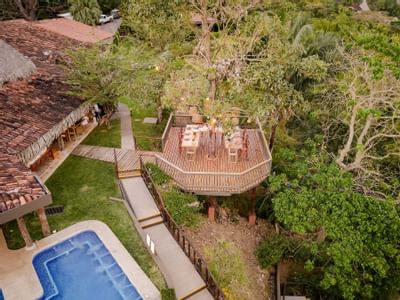 View of a restaurant and pool area at Punta Islita Hotel