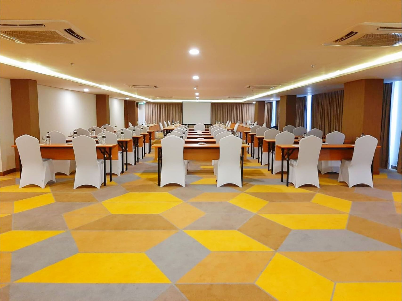 Classroom type event table set up in Meeting Room at LK Pemuda Semarang Hotel & Residences