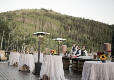 Exterior view of an outdoor dining area at Stein Eriksen Lodge