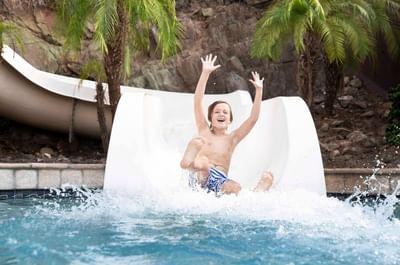 Kid on waterslide