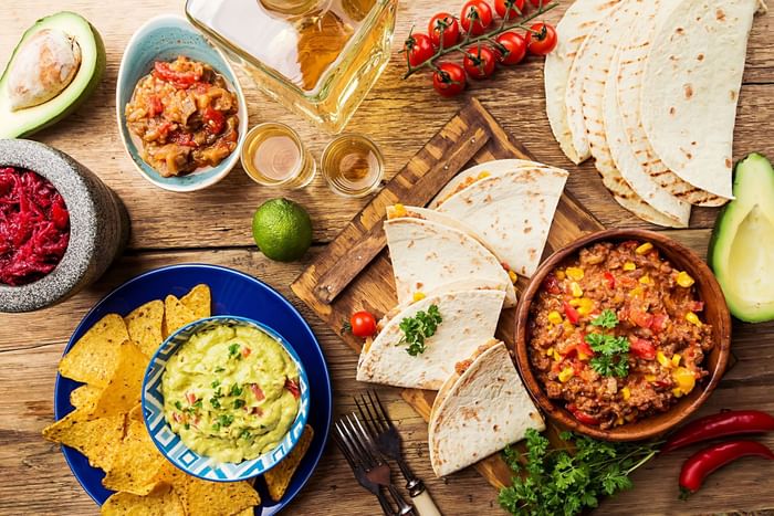 Display of Mexican food, including chips, salsa & tortillas featuring Camo Eats at Anaheim Portofino Inn & Suites