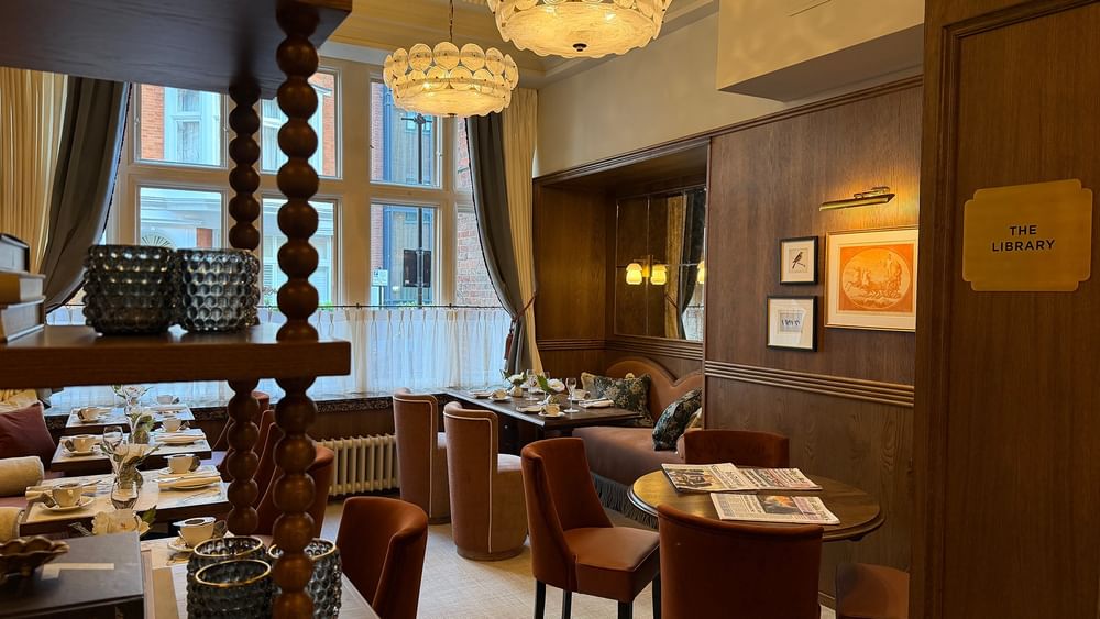 Traditional British Afternoon Tea setting in the library at The Capital Hotel in London.