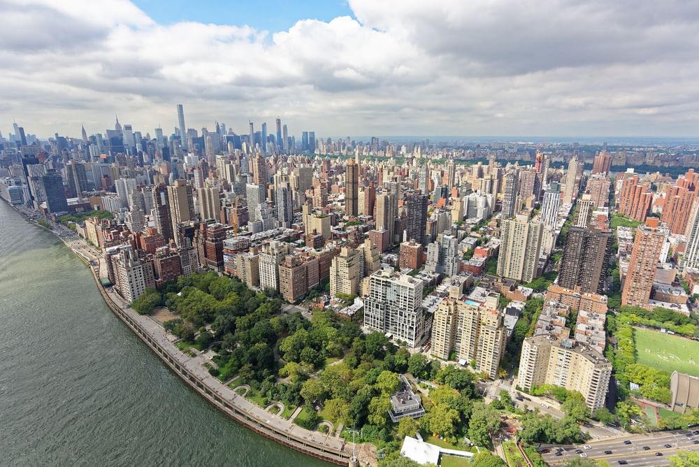 Aerial view of a cityscape with many buildings and skyscrapers at Warwick New York