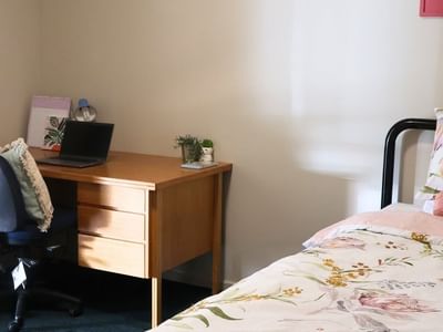 Bedroom with desk and bed at La Trobe University - Villas.
