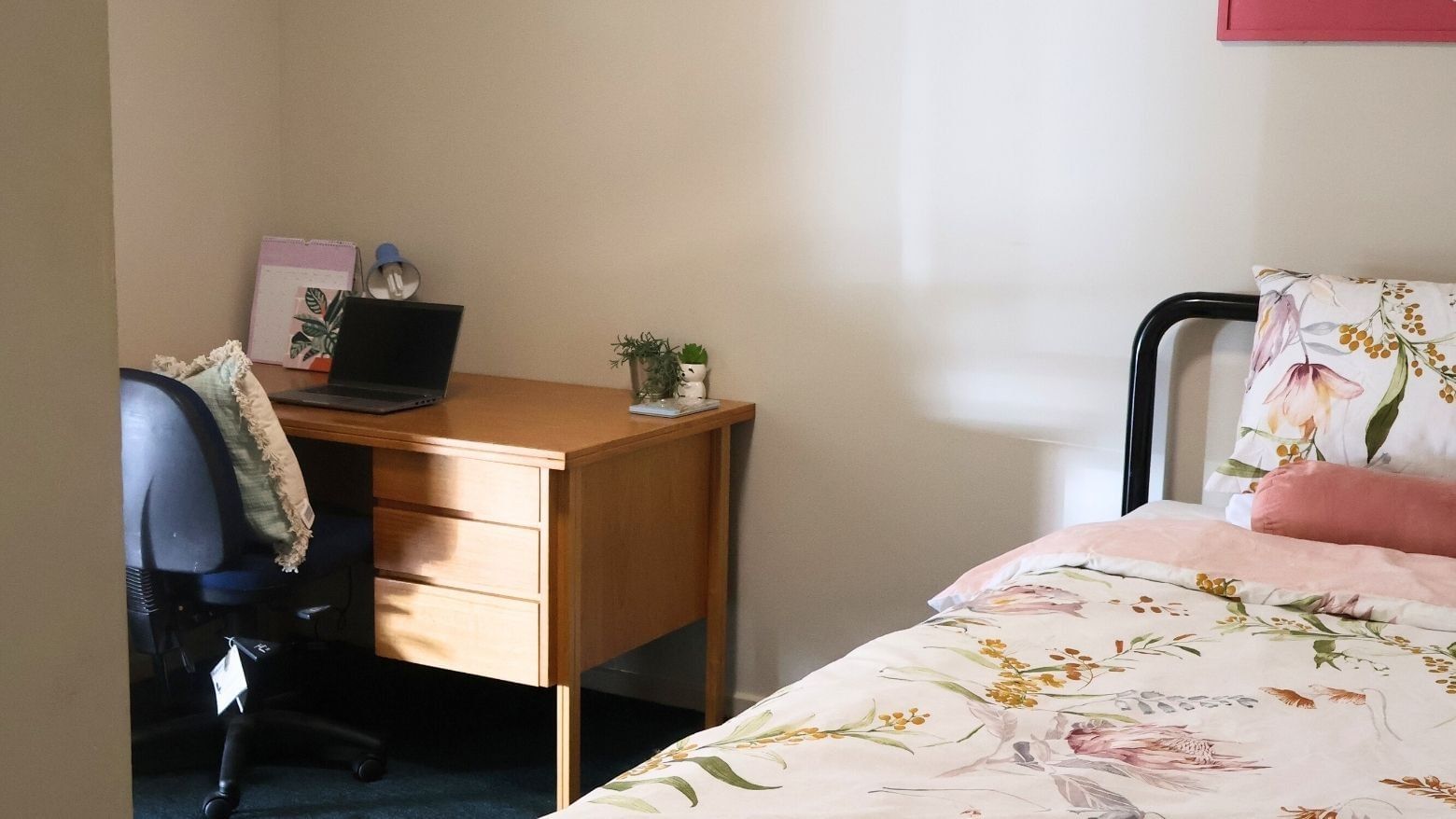 Bedroom with desk and bed at La Trobe University - Villas.