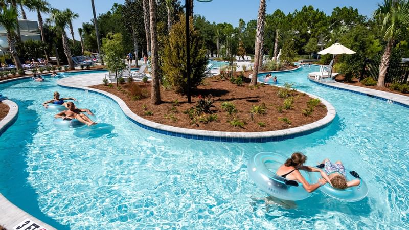 People are enjoying in the outdoor pool at WaterColor Inn