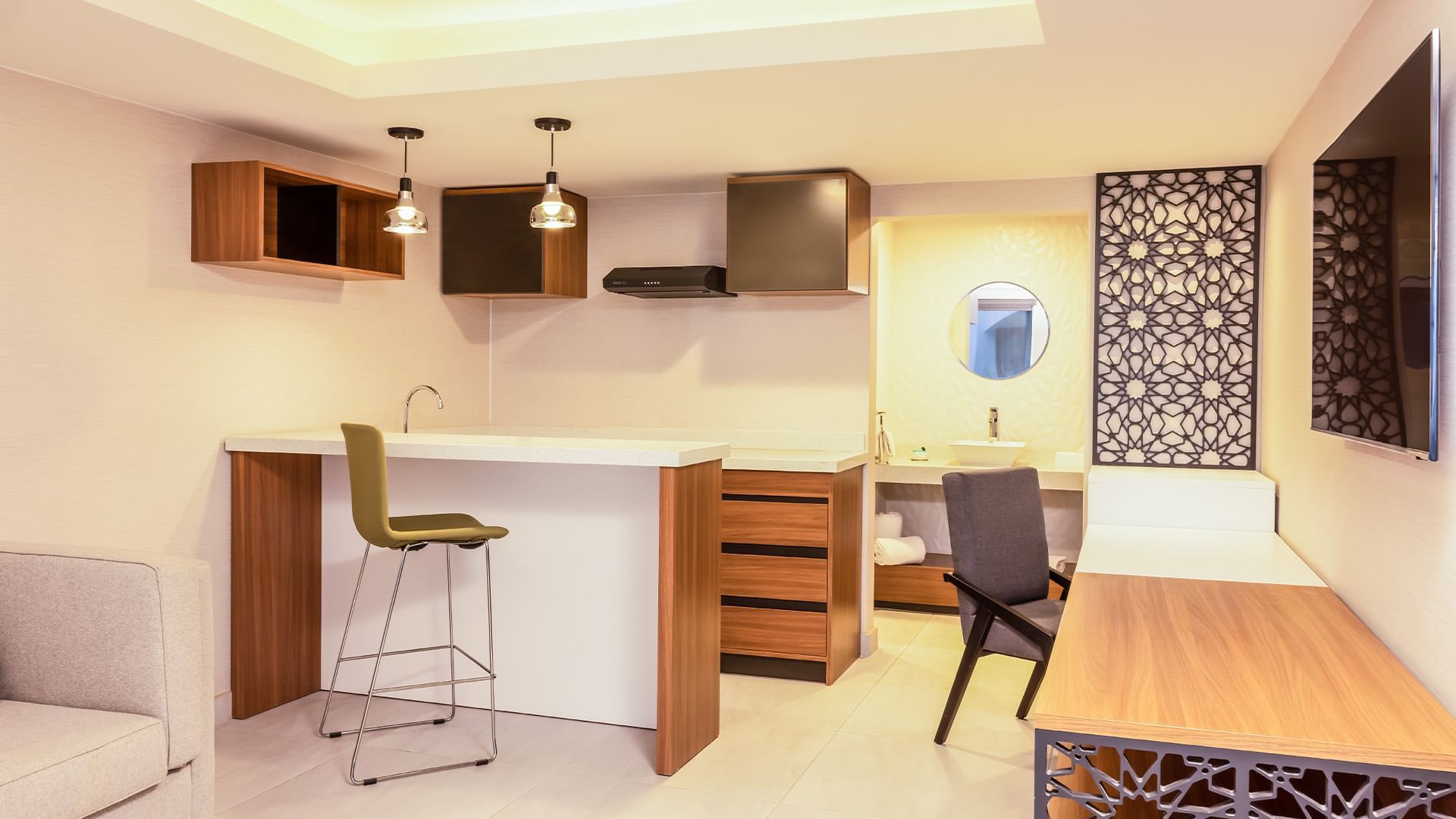 Work desk & kitchen area in a Room at Gamma Ciudad Juarez