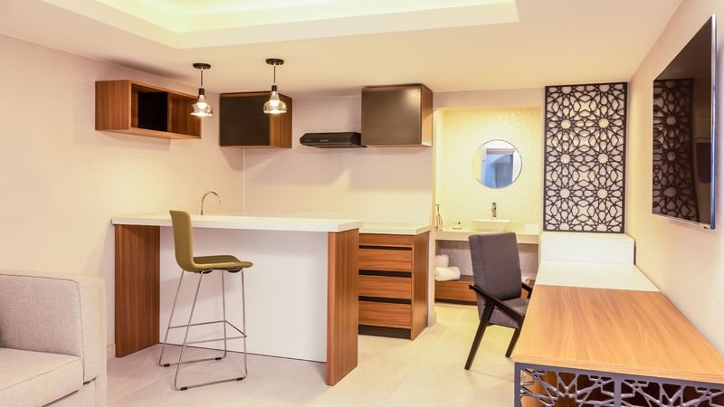 Work desk & kitchen area in a Room at Gamma Ciudad Juarez