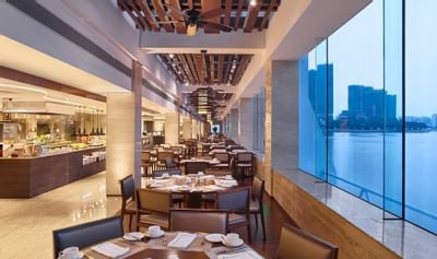 Interior of River café with a city view at White Swan hotel