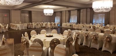 Banquet table set-up in a wedding hall at Ethan Allen Hotel