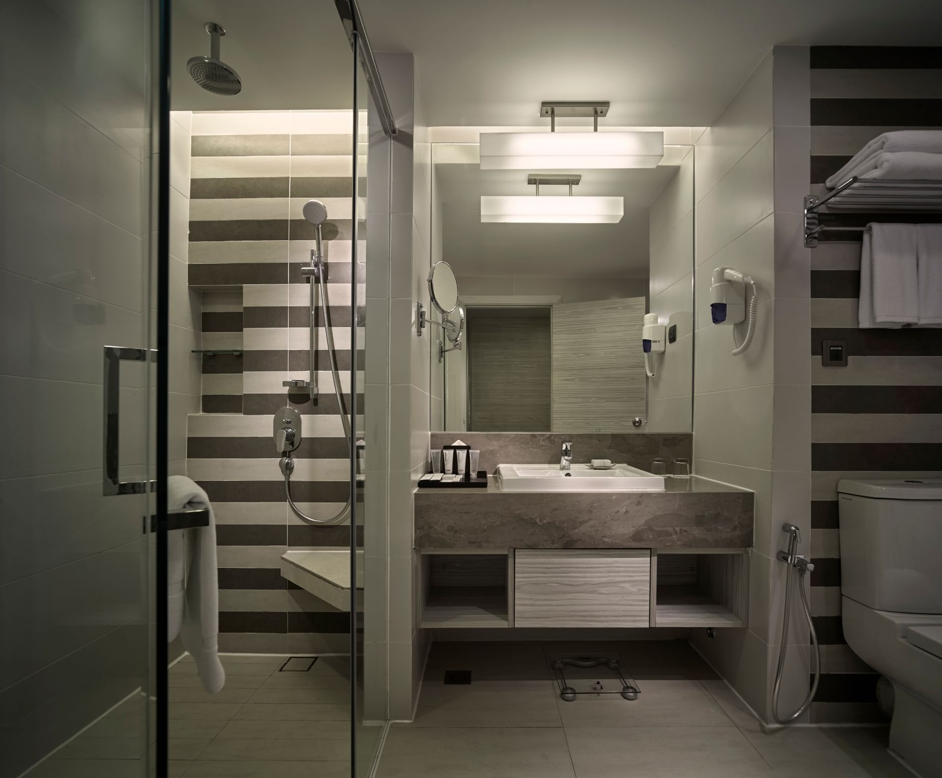 Vanity & shower room in Deluxe Room at Sunway Putra Hotel