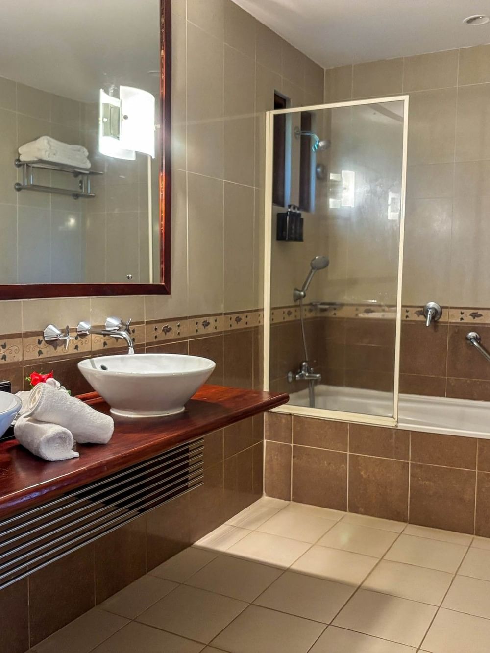 Elegant bathroom with dual sinks and bathtub at The Naviti Resort, Korolevu.