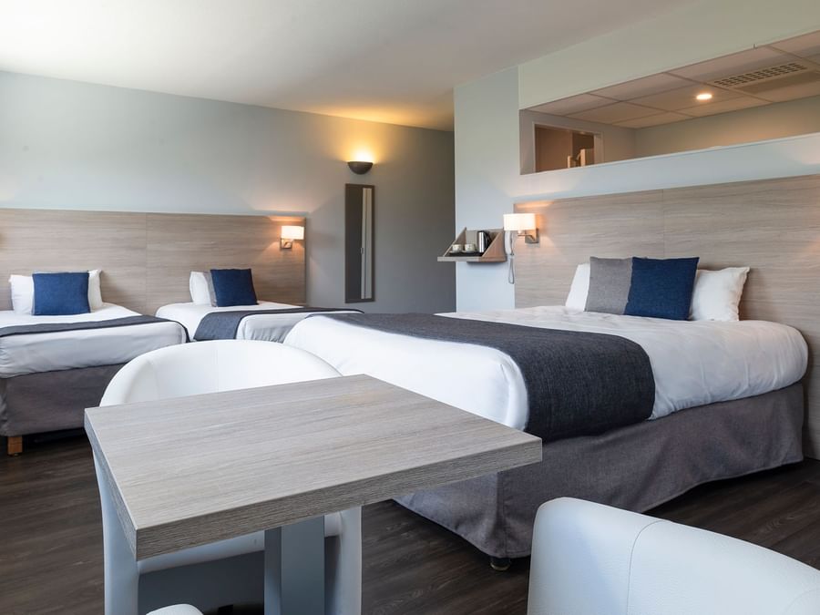 Standard Quadruple Room with comfy beds at Originals Hotels