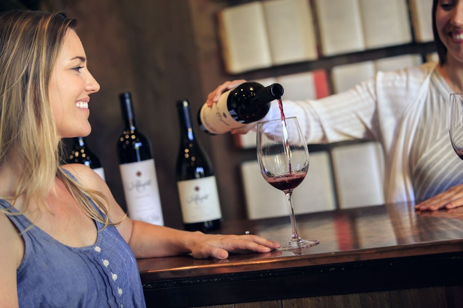 Lorem ipsum A woman tasting in the Willow Creek Tasting Room