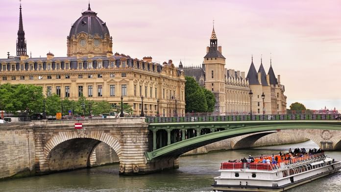 Aerial view of Conciergerie Museum next to Seine River near Oceania Hotels