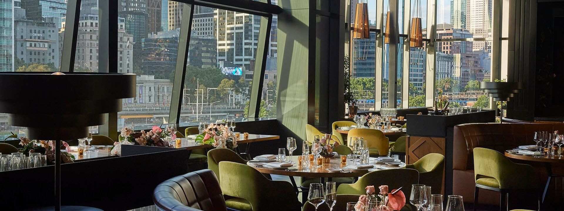 Dining tables arranged in a restaurant at Crown Hotel Perth Spa