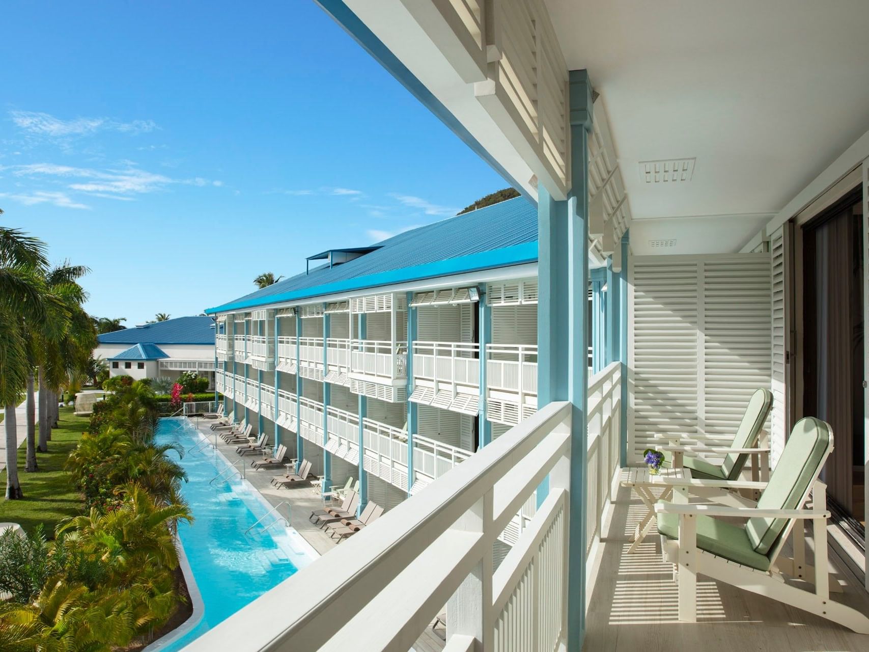 Private balcony of 2 Queen Bed with Courtyard View at Saint Martin Beach Resort & Spa, one of the best St. Martin resorts