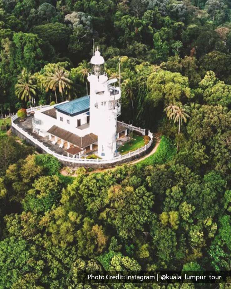 bird eye view of Cape Rachado Ligthouse surrounded by trees