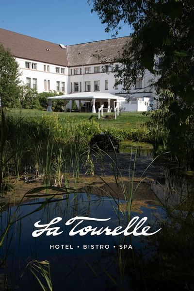 Backyard Pond with waterfall at La Tourelle Hotel and Spa