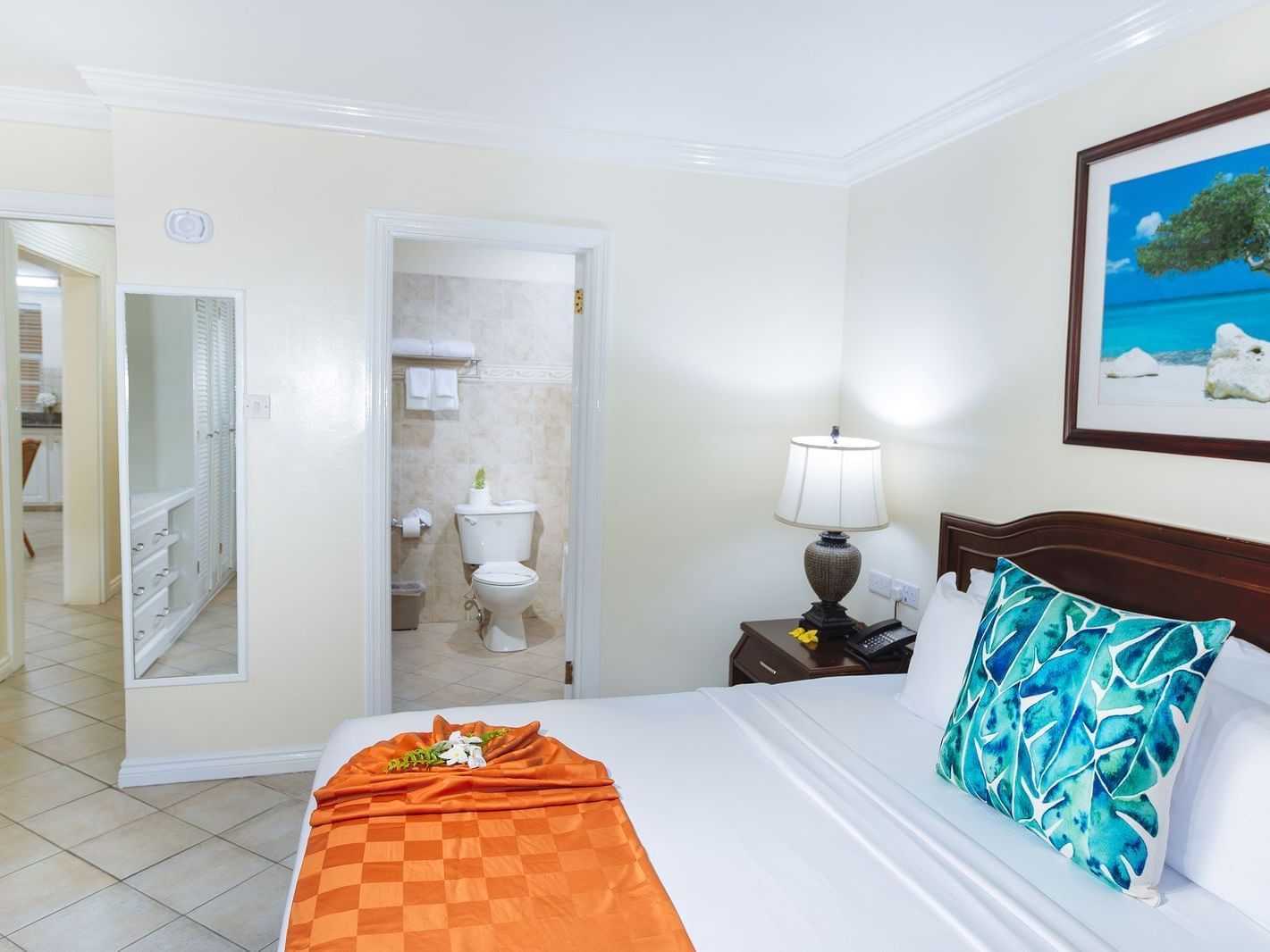 bed with restroom in bathroom