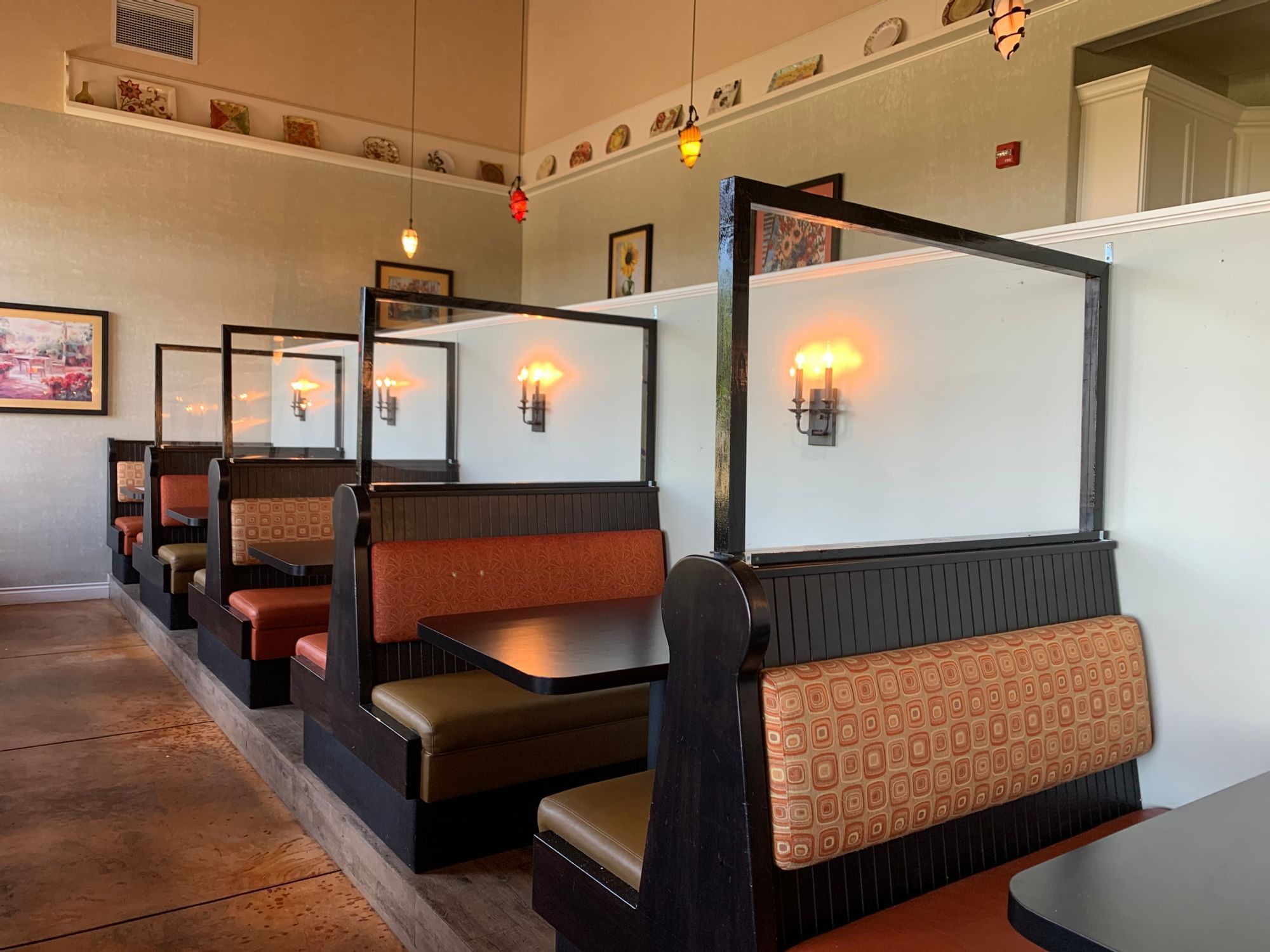 Plexiglass between restaurant booths