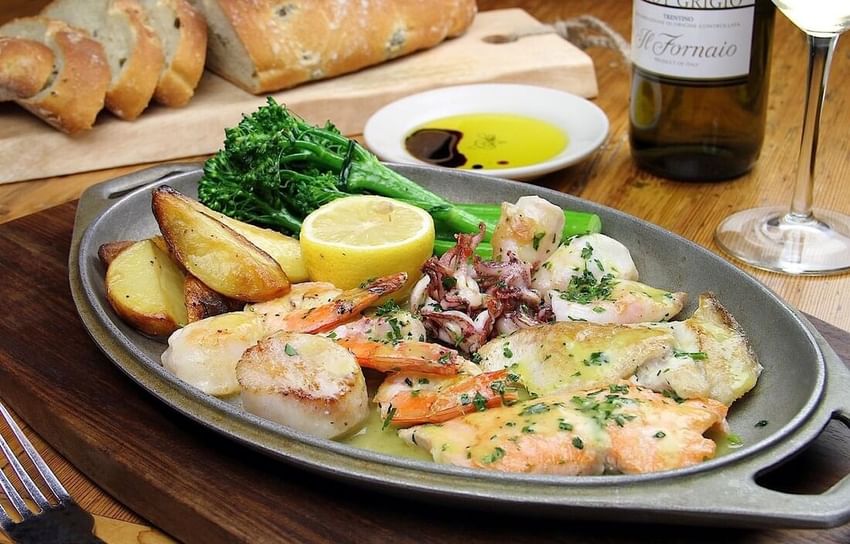 Close-up of Grigliata di Pesce Misto served by Pine Inn Carmel Restaurant of Il Fornaio at Tally Ho Inn