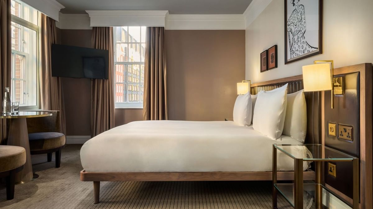 A luxurious Collection Deluxe Room at The May Fair Hotel in London.