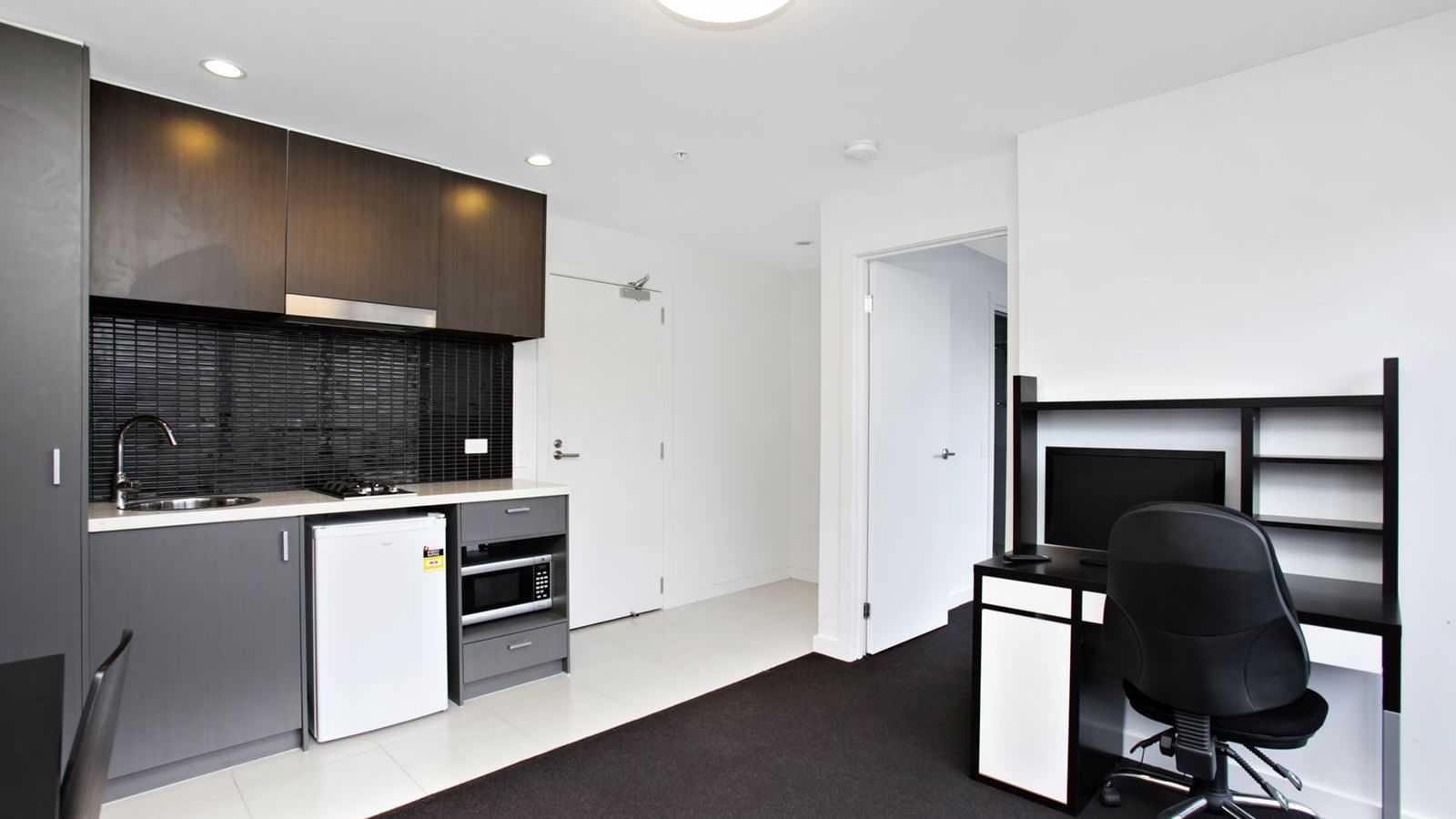 Self-contained one bedroom apartment - lounge & kitchen view