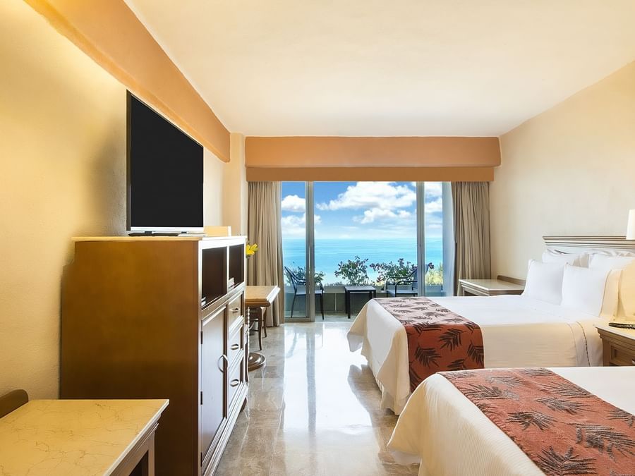 2 Double beds, TV in Fiesta club penthouse at Fiesta Americana