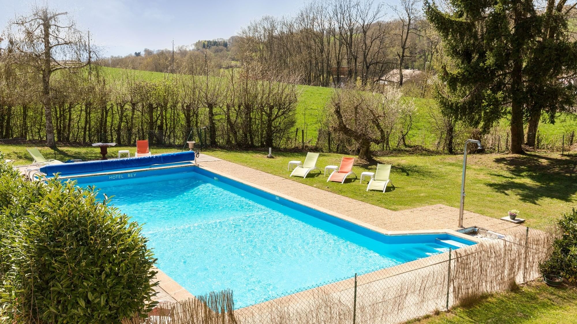 High angle view of a pool  surrounded by trees at The Originals