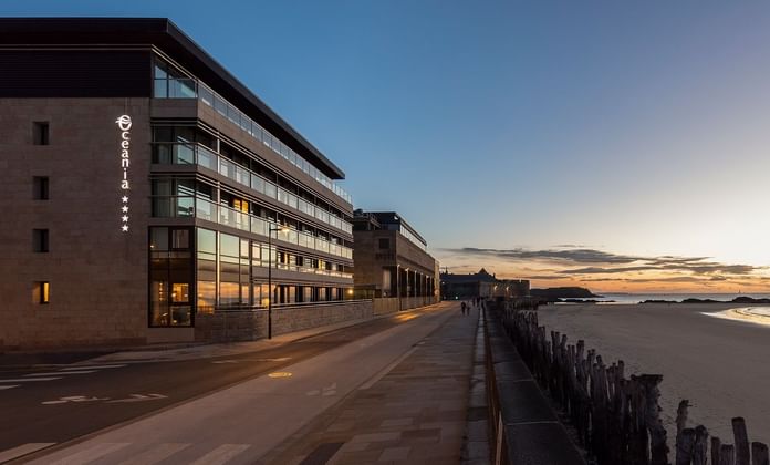 Exterior view & the entrance of Hôtel & Spa Oceania Saint-Malo at dawn