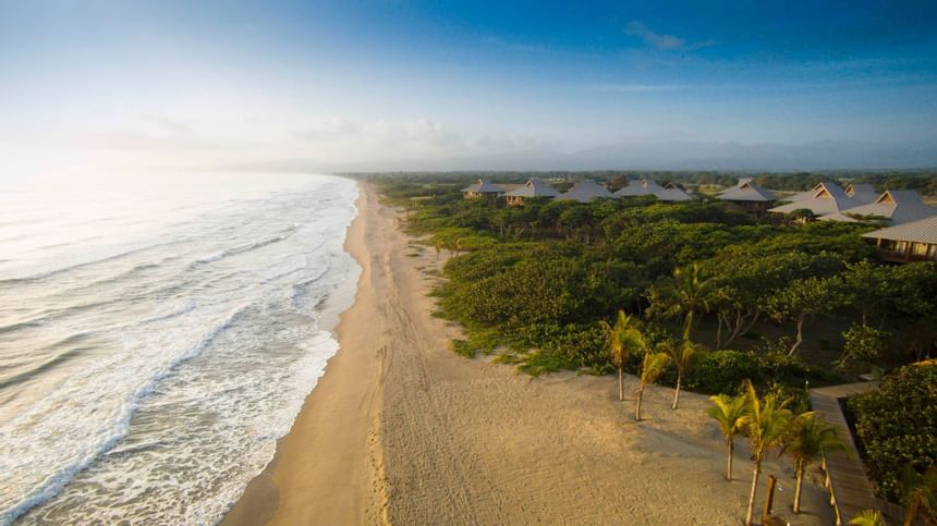 Aerial view of the coastline near Indura Resort