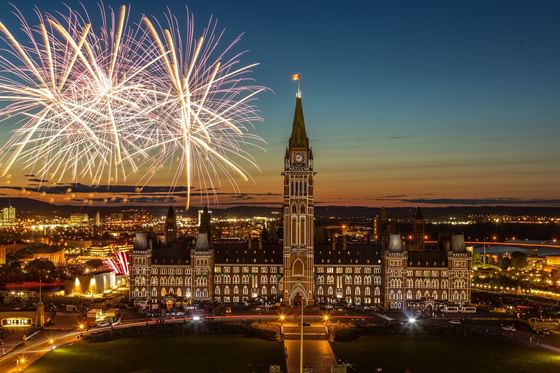 Fireworks over the parliament building near ReStays Ottawa