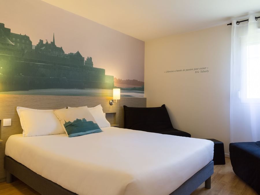 View of the Quadruple Family room at The Originals Hotels 