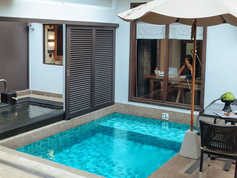 Private plunge pool with umbrella, dining table, and jacuzzi in a luxury villa promoting 20% off stay at the banjaran