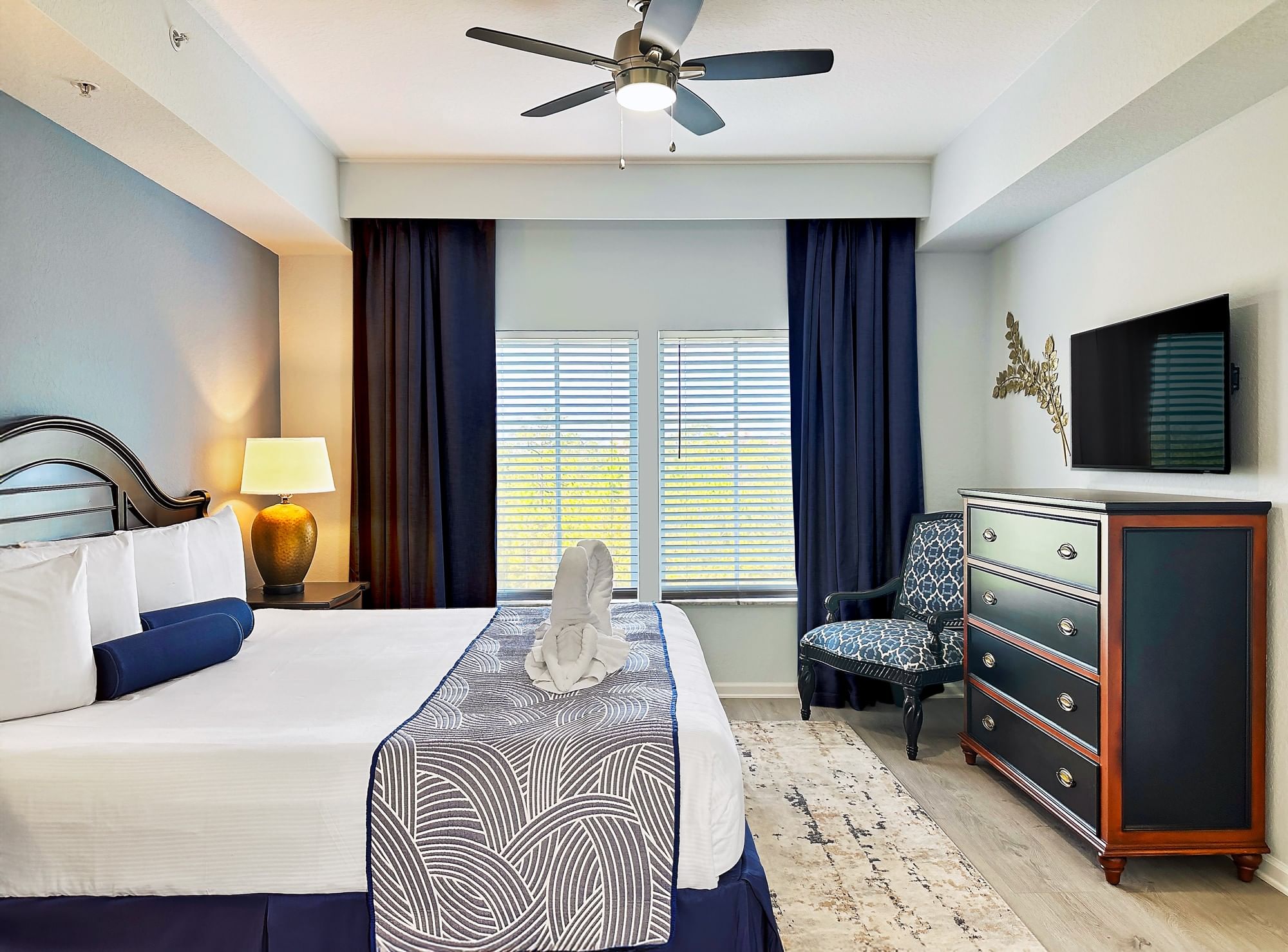 Signature Collection Suite - Master bedroom and flat screen tv