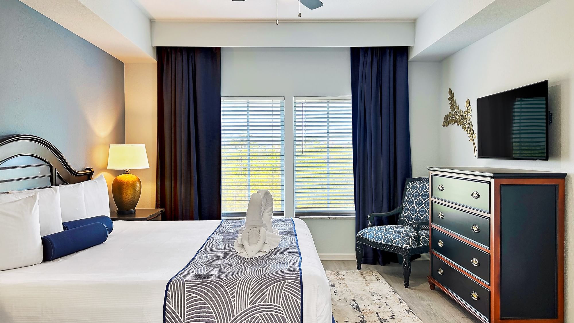 Signature Collection Suite - Master bedroom and flat screen tv