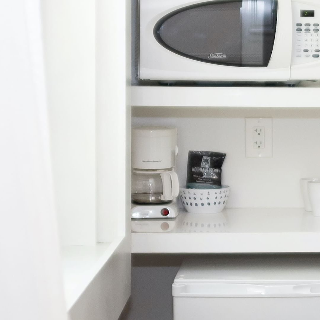 Closeup of a microwave in a Kitchenette at Riviere South Beach