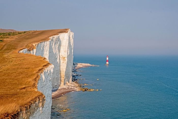 Lighthouse from Seven Sisters cliffs near The View Eastbourne