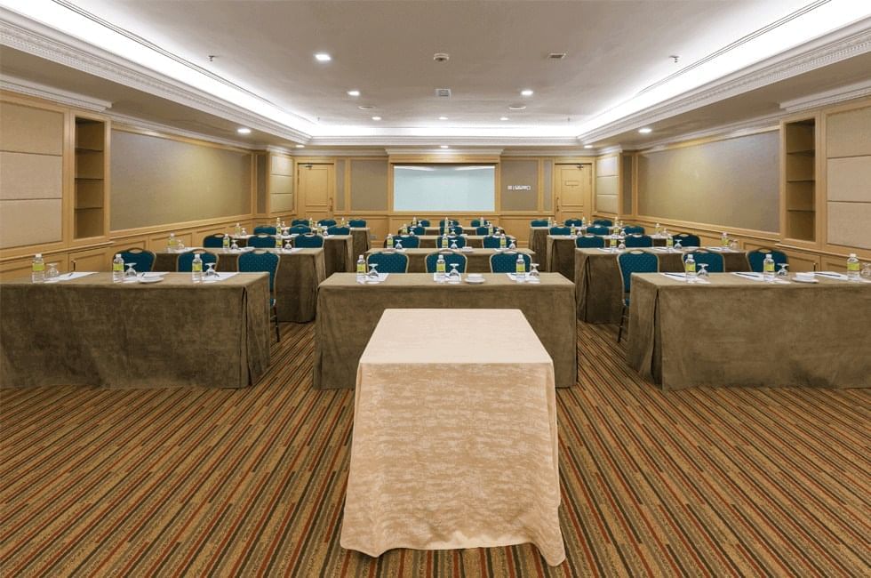 Classroom typed event hall arranged with a large screen at Sunway Hotel Seberang Jaya